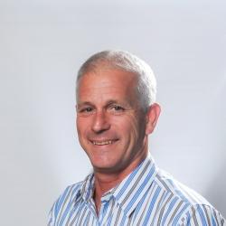 Headshot of James C. Baker 