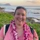 Headshot of Katherine Troyer on a tropical island