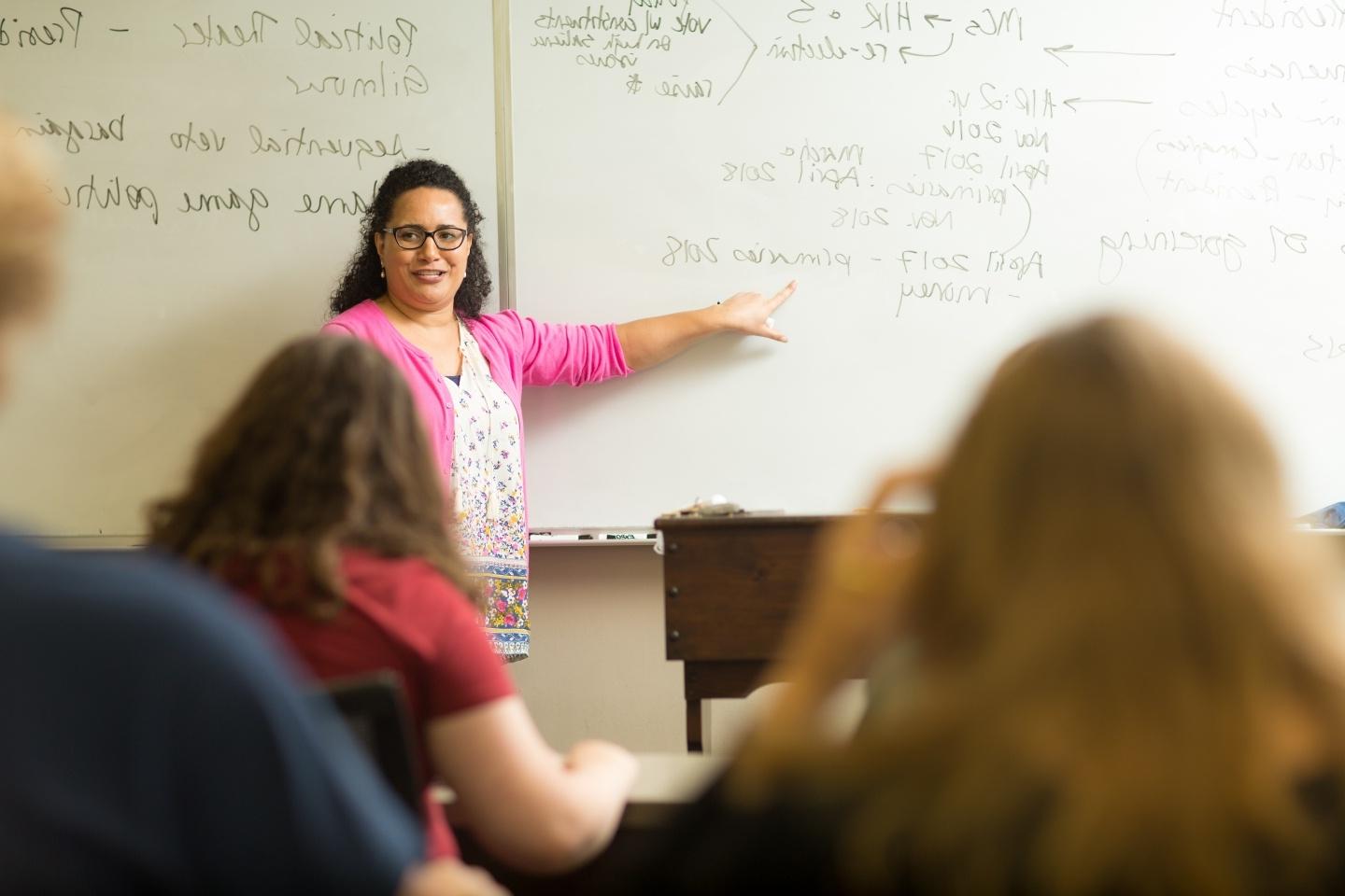 Students in a political science class with their professor