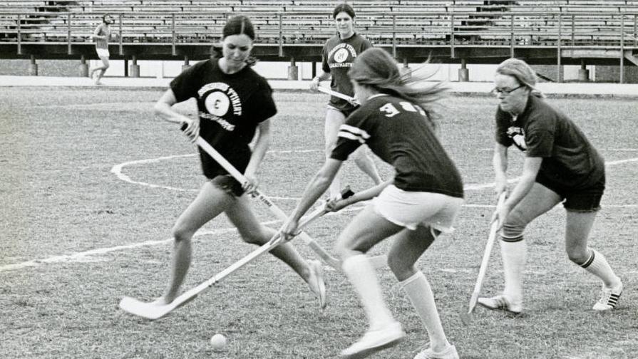 Trinity women play field hockey circa 1980