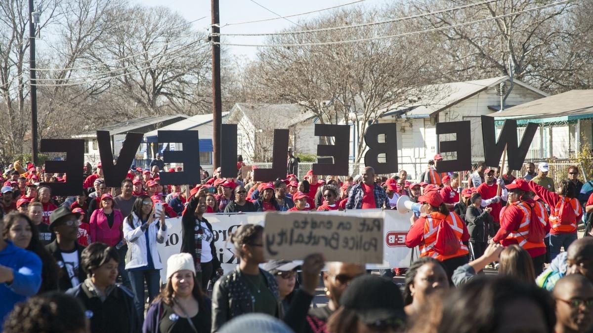 Students participate in a march 