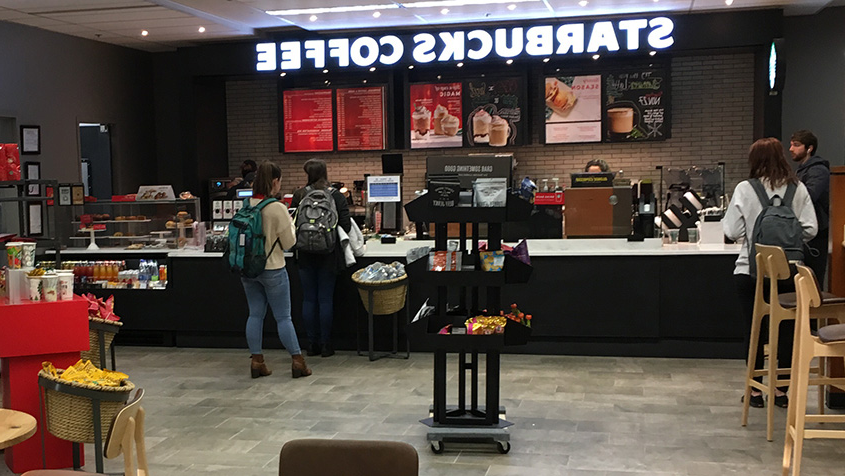 Students in waiting in line at Starbucks